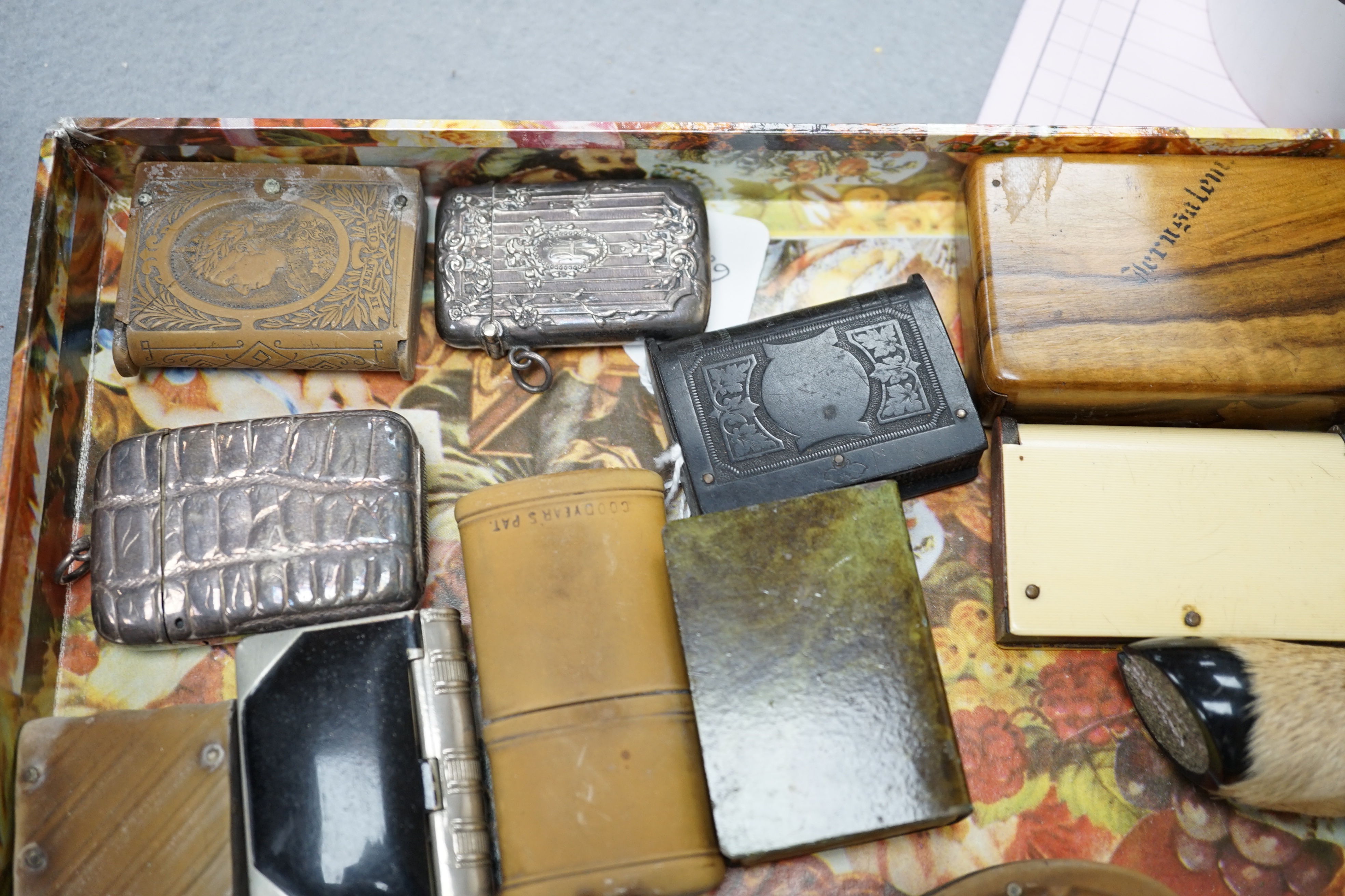 A collection of Victorian and later vestas and matchbox holders, some commemorative